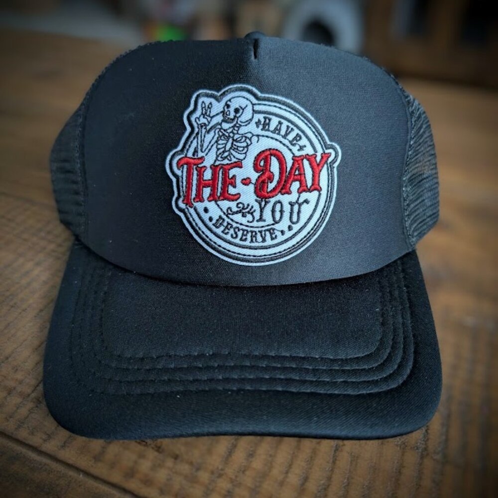 Trucker hat with iron on patch